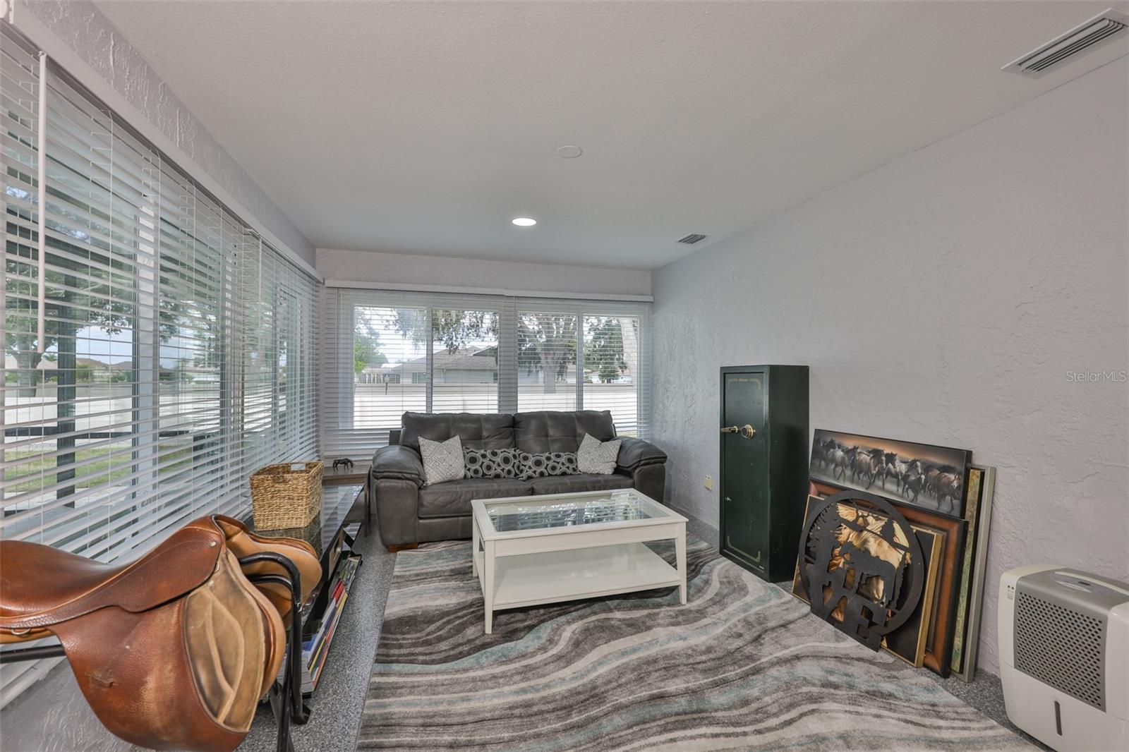 Clean, modern and spacious for a variety of activities, even a fourth bedroom, if desired.
