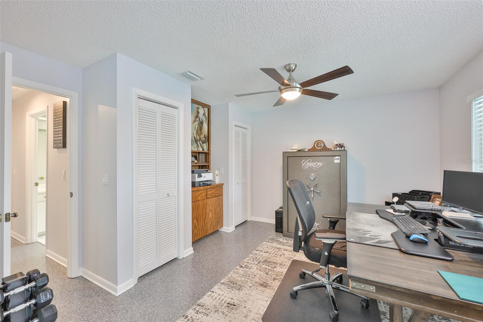 Bedroom #3 (currently used as an office) is spacious with dual closets.