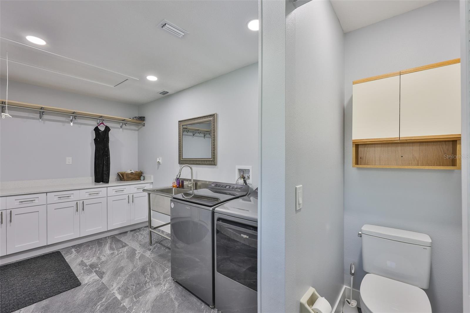 Fully remodeled indoor laundry room WITH a half bath included!