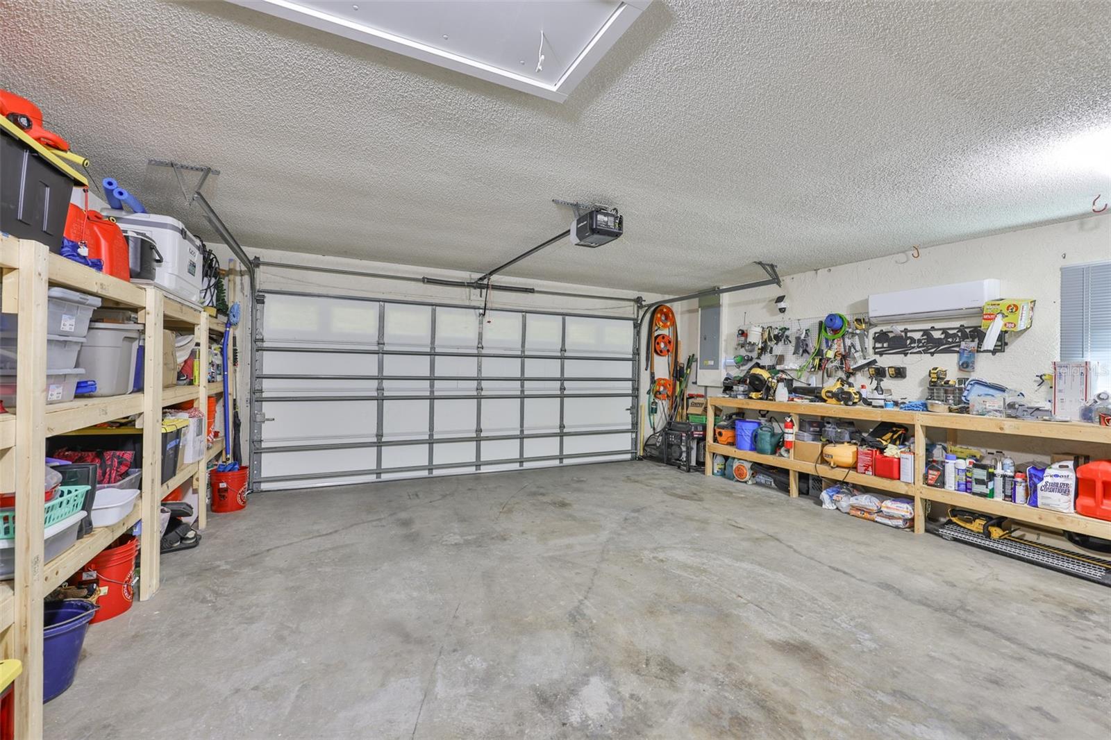 Garage has a mini split installed, so that everything stays cool with the help of the insulated garage door.