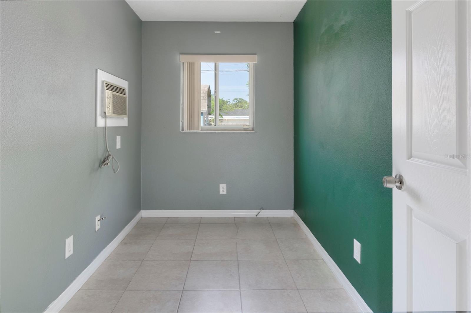sitting room within the 2nd bedroom