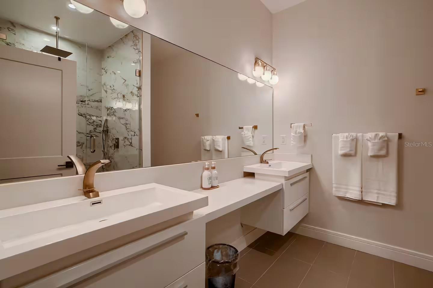 Primary Bath with Floating Vanities