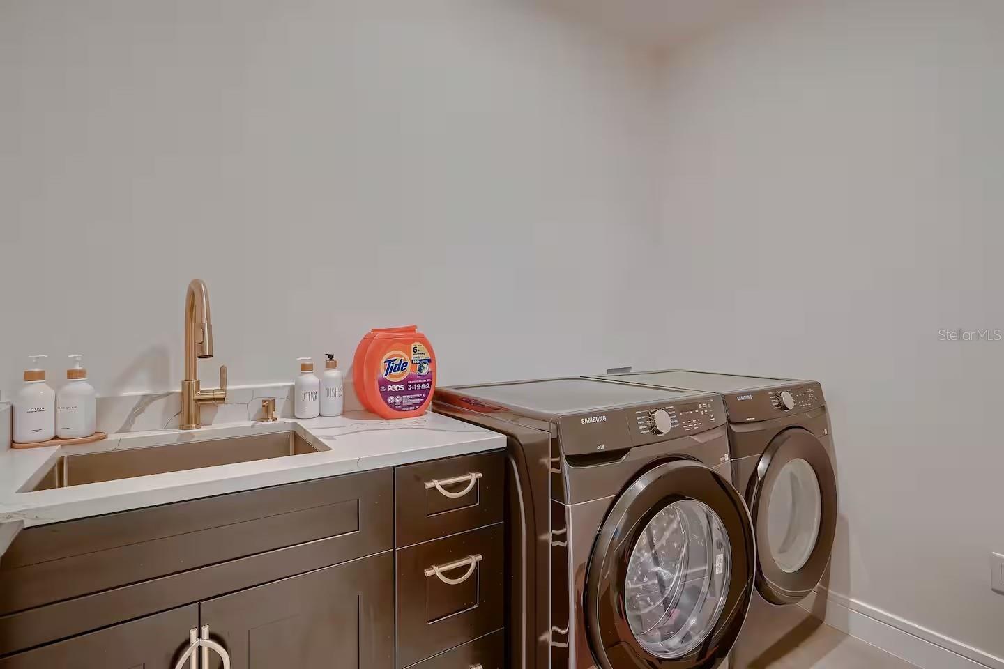 Laundry Room off of the Kitchen - Plenty of Room for Storage