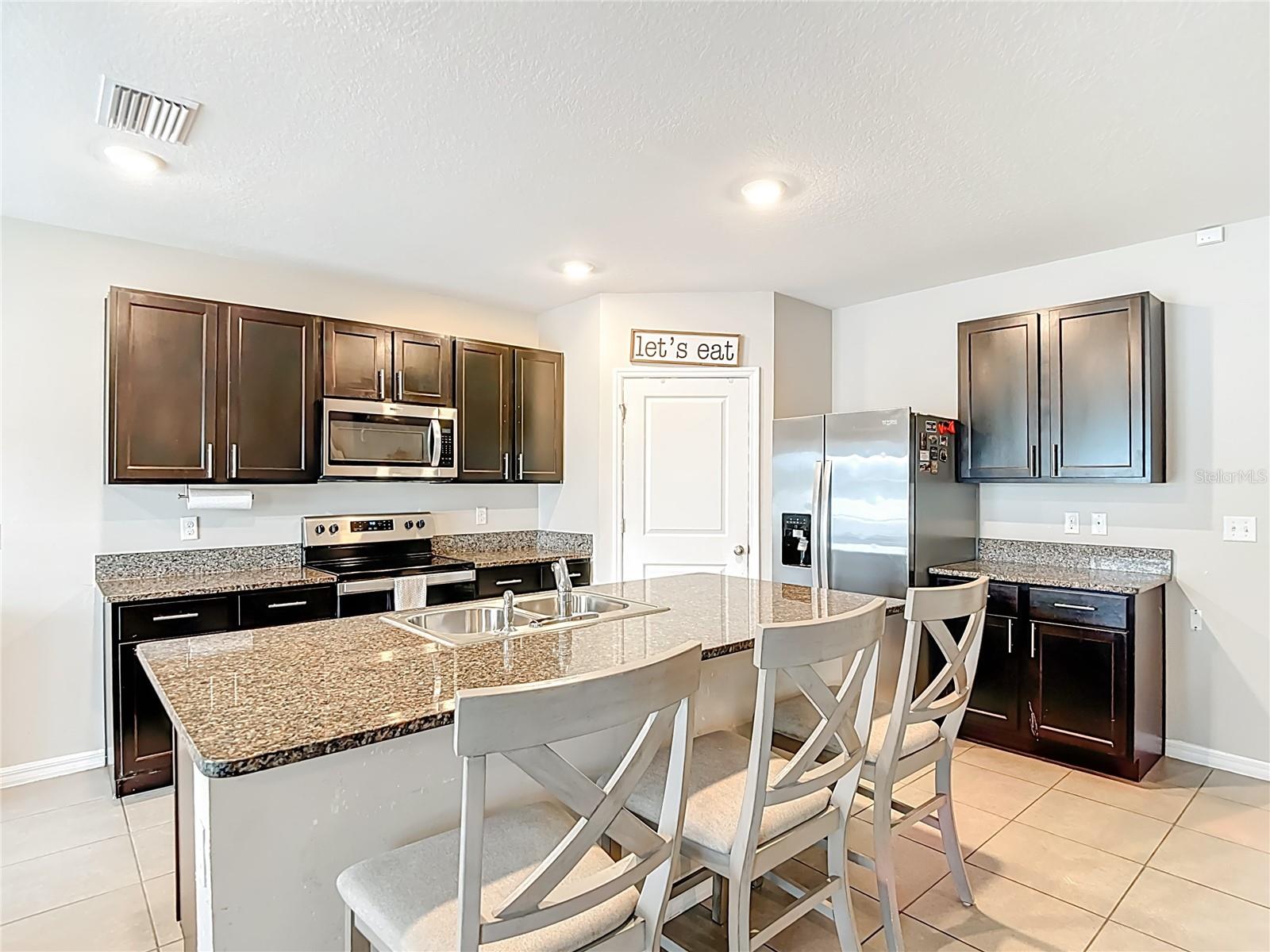 Kitchen with stainless steel appliances