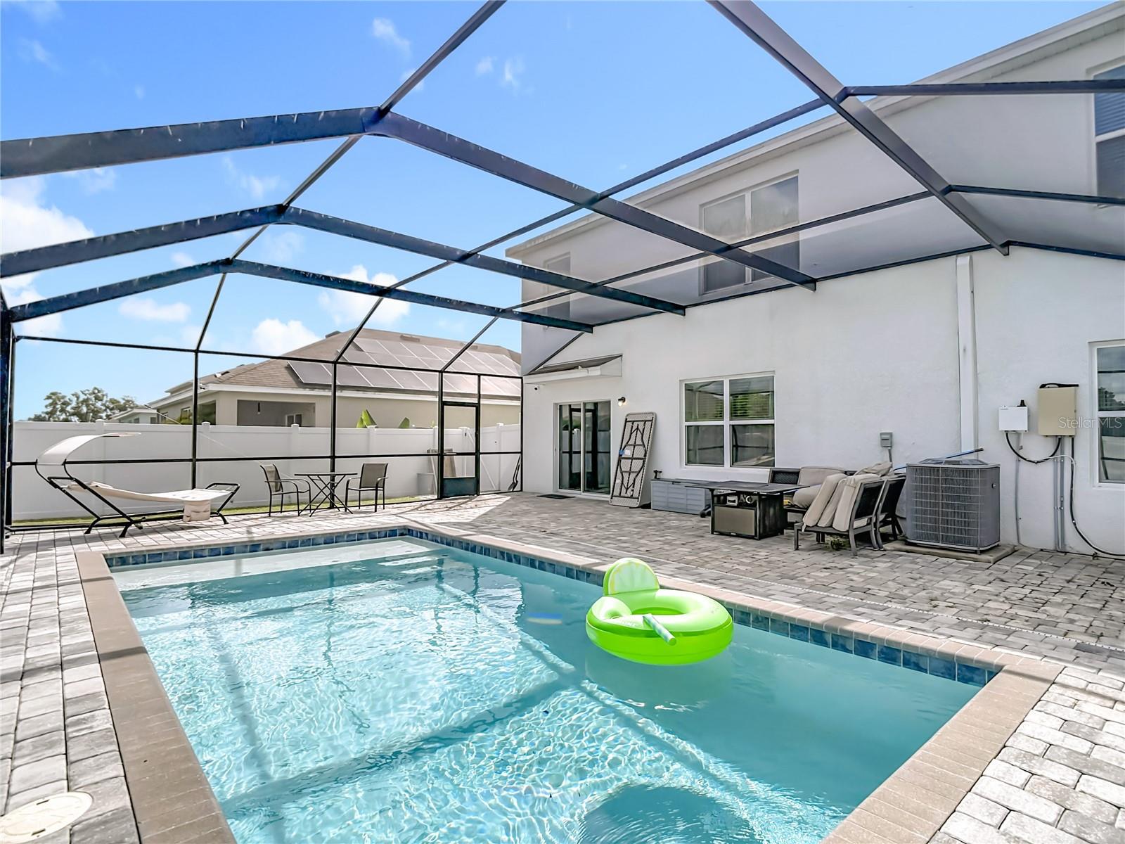 Pool with Pool Cage and paver deck completed in 2023