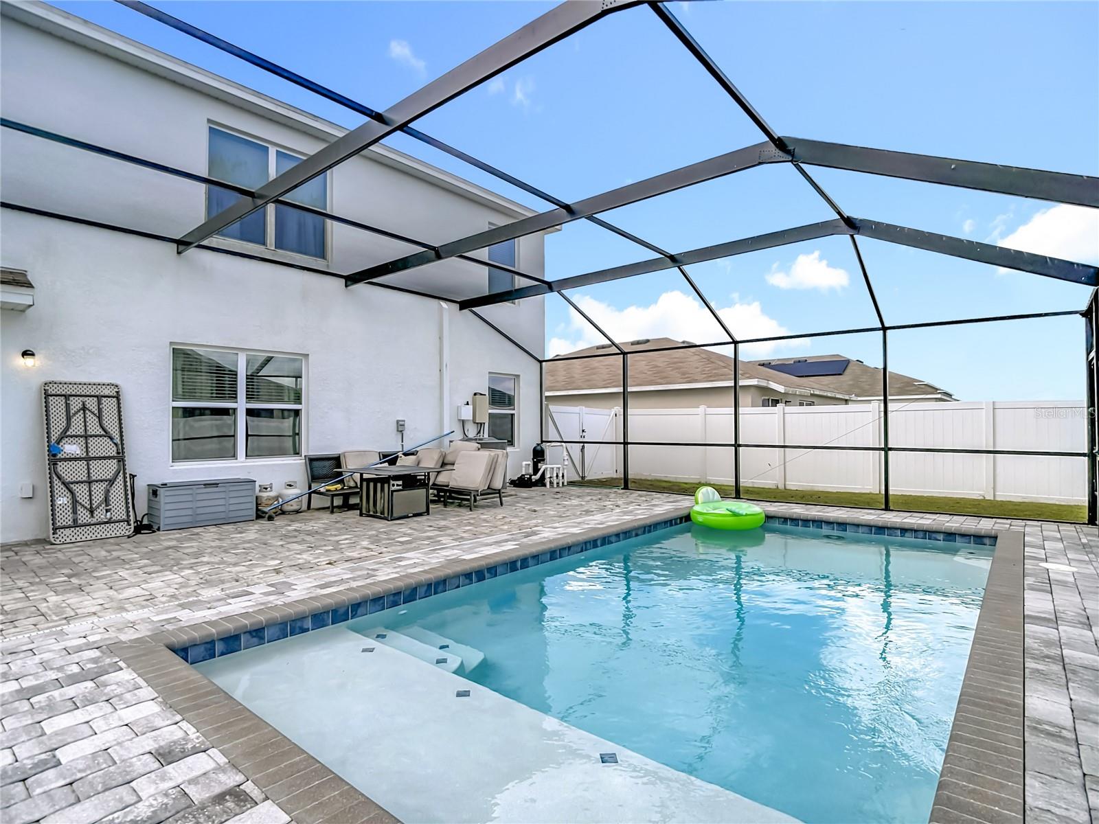 Pool with Pool Cage and paver deck completed in 2023
