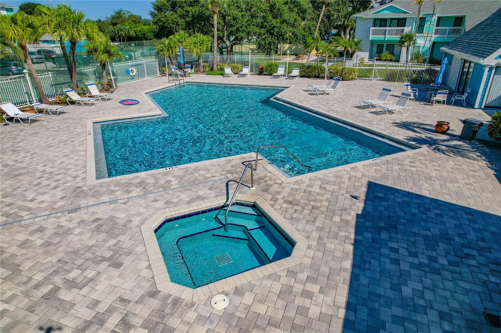 ONE OF THE COMMUNITY POOLS AND SPA!
