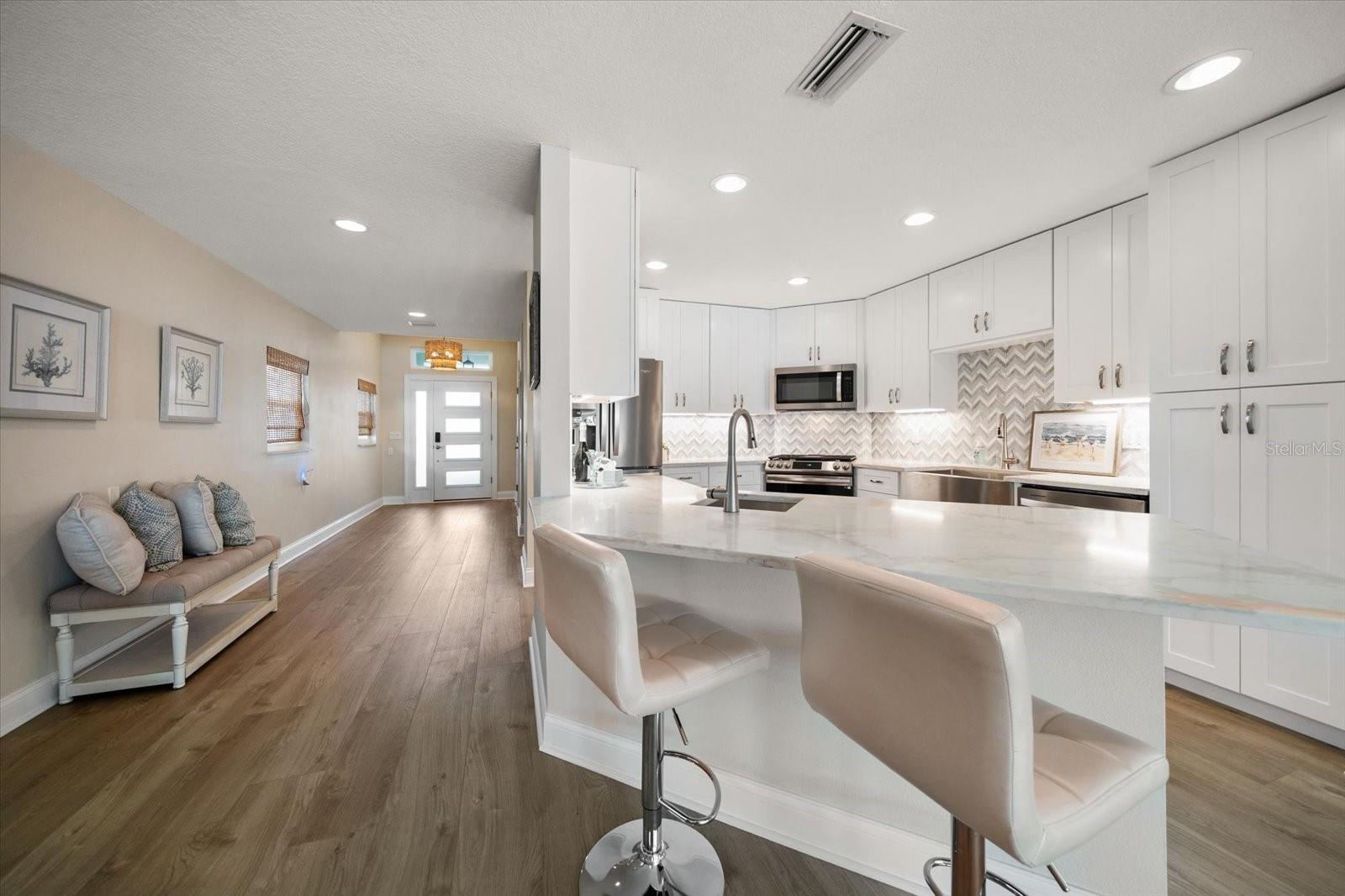 Peninsula bar with Quartz countertops.