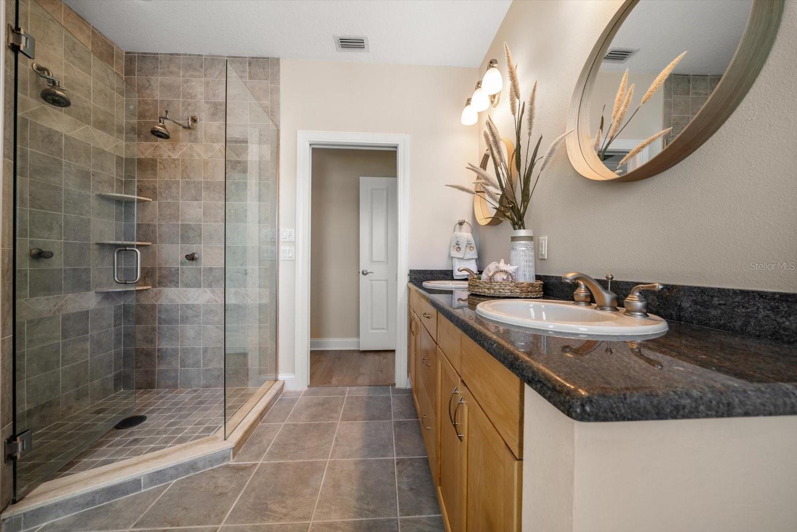 Primary bathroom has large walk in shower