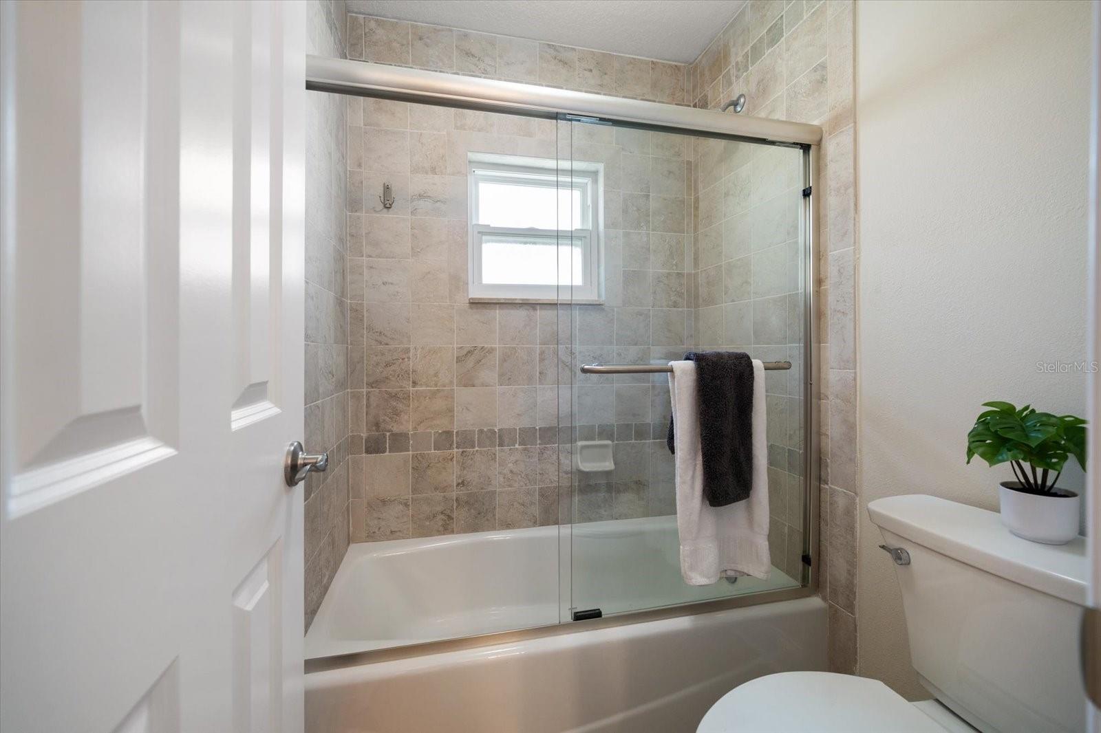 Bathroom on main living level with tub