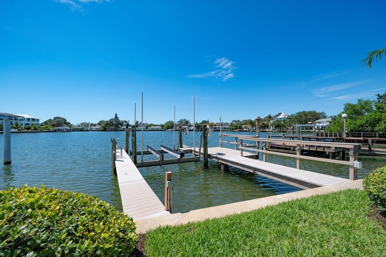 Dock with low maintenance composite finished dock and 16,000 pound capacity  boat lift
