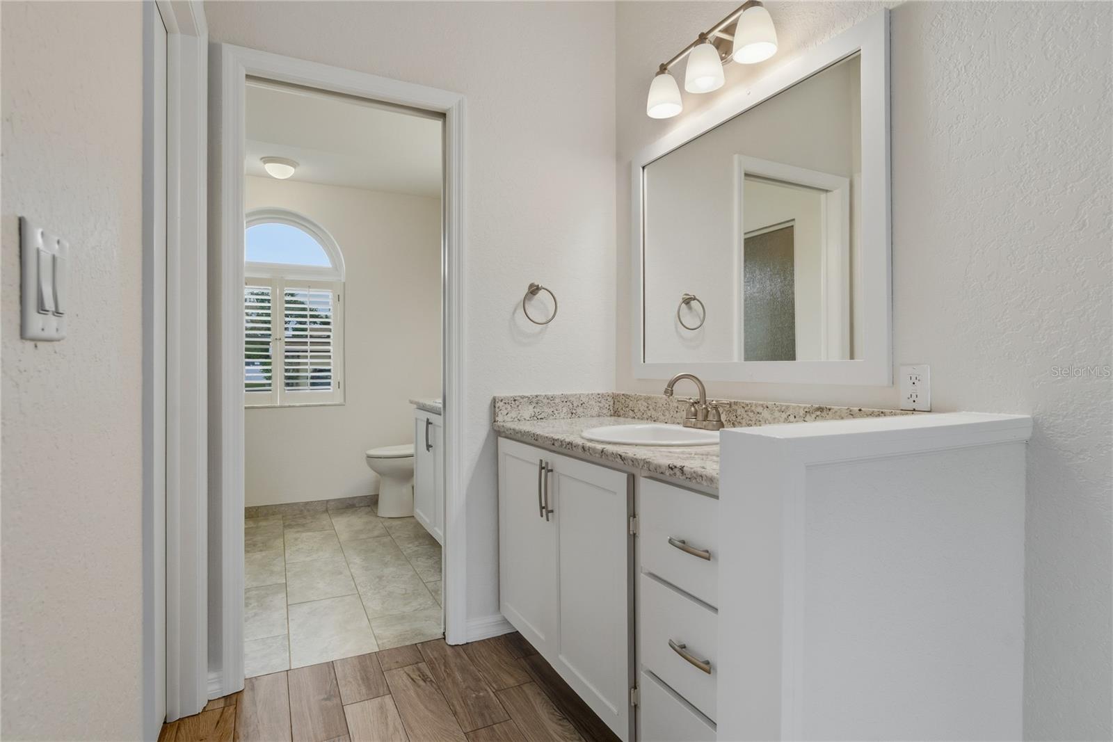 Primary Bedroom Vanity Area Showing Entry to EnSuite