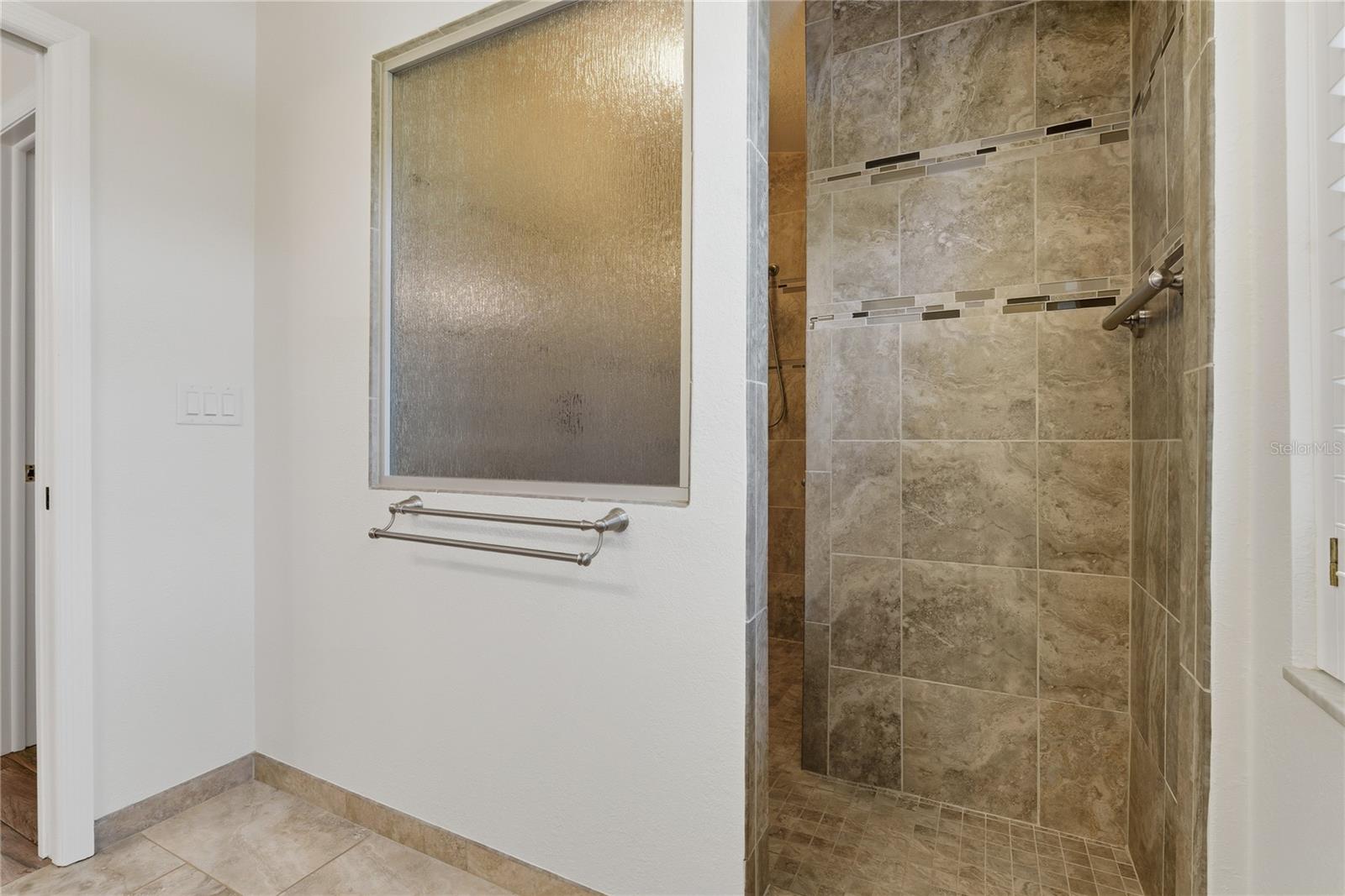 Primary Bathroom Walk In Shower Entrance View