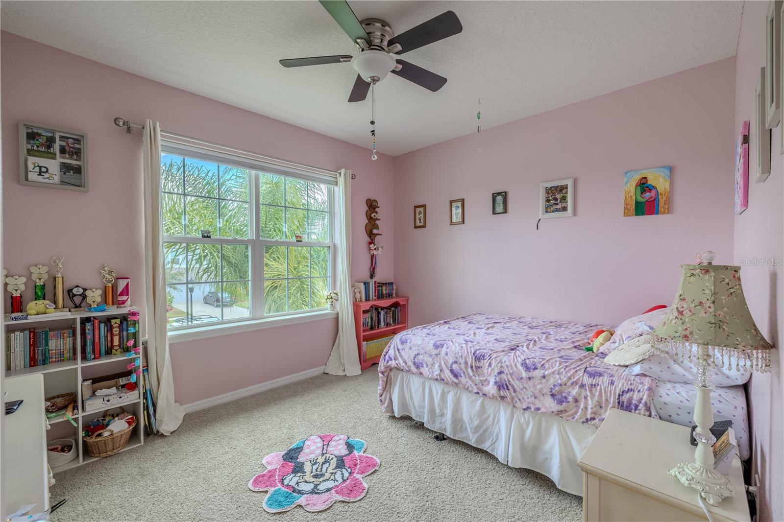 Bedroom 4 includes a spacious walk-in closet, ceiling fan, and a large window.