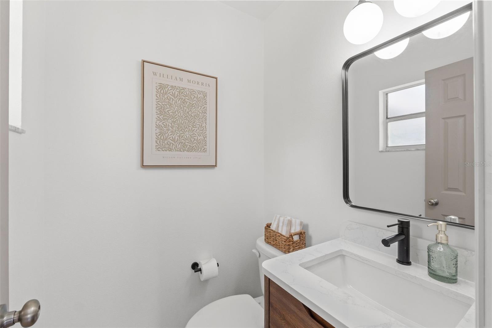 primary bedroom half bathroom