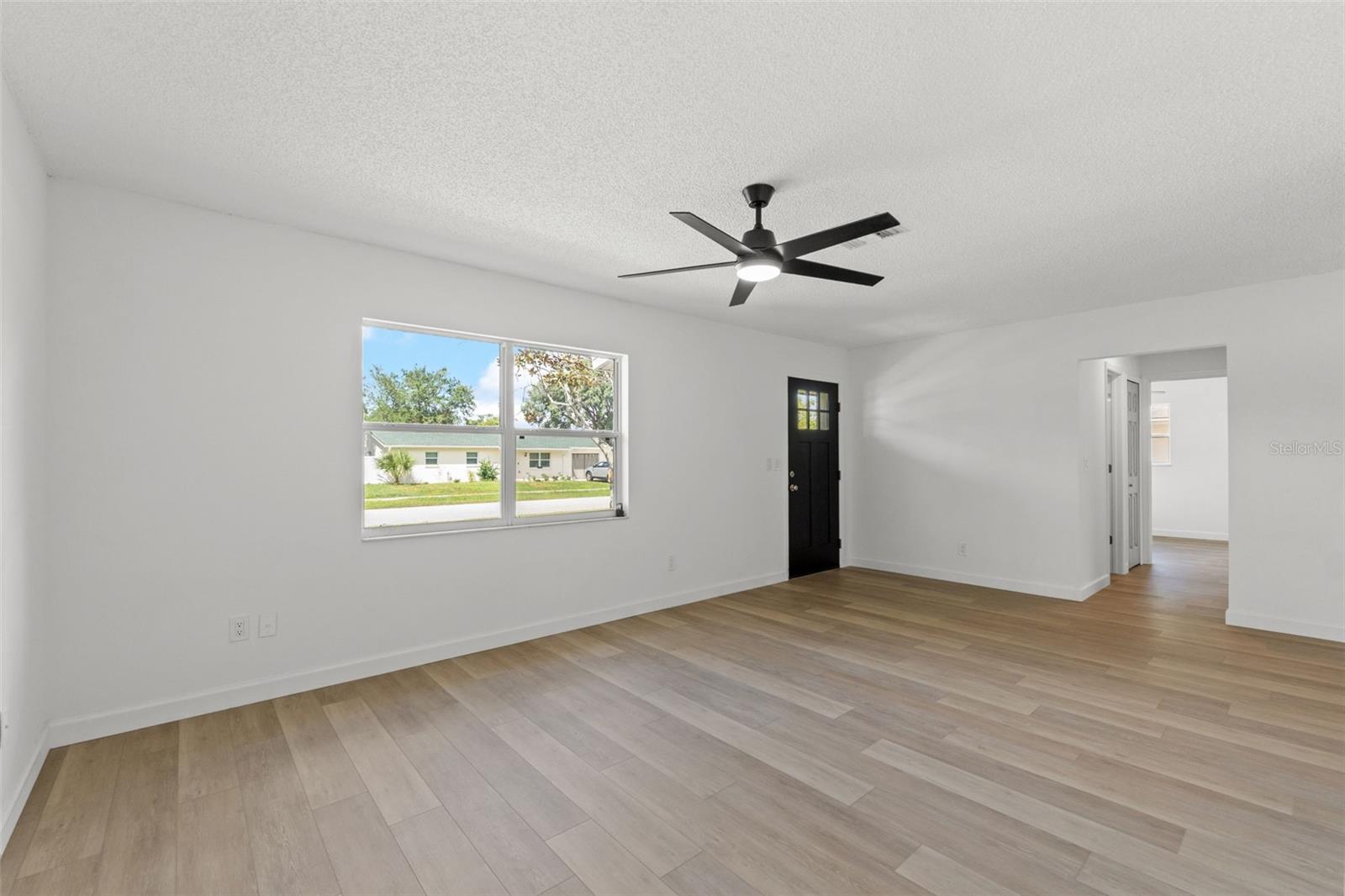 Living/Family Room - fresh paint, newer windows, new flooring