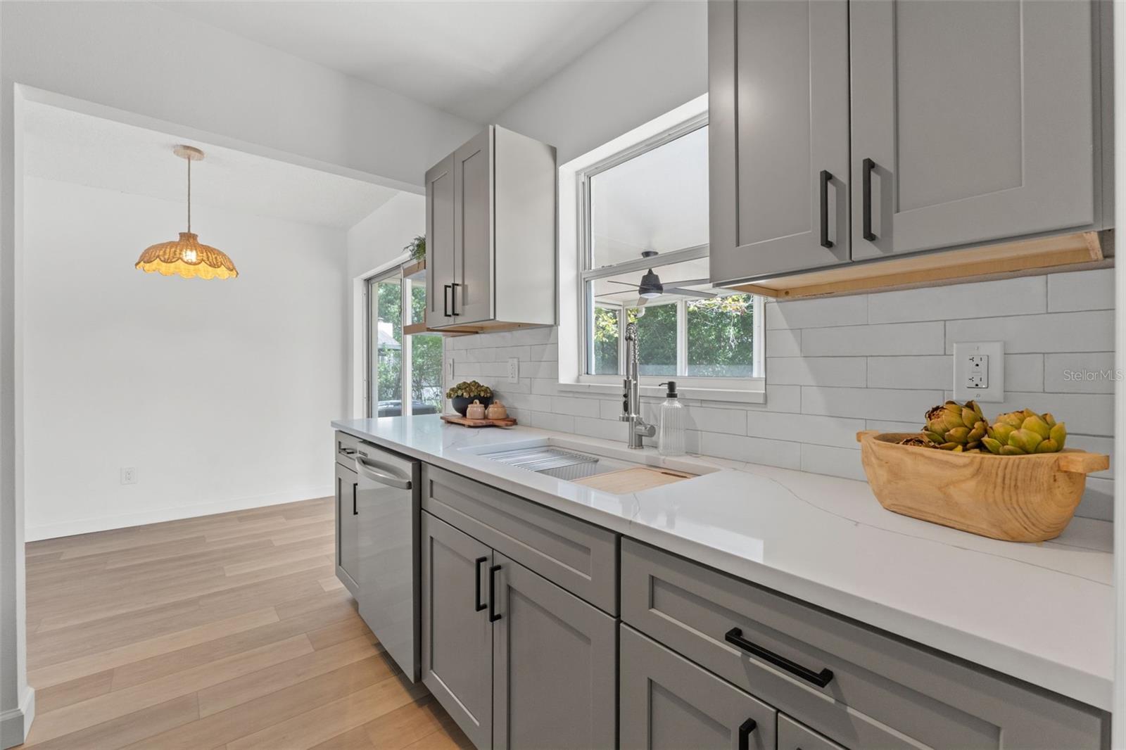 New kitchen cabinets, appliances and backsplash