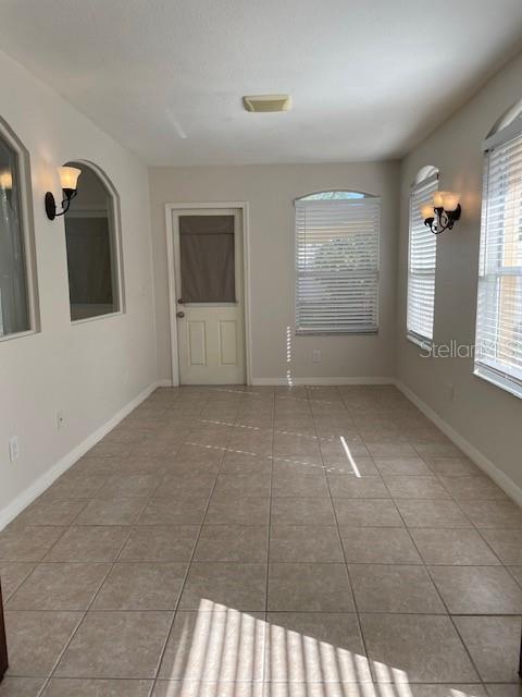 Bonus / Office/ Den / Flex Space with Exterior Door to backyard.
