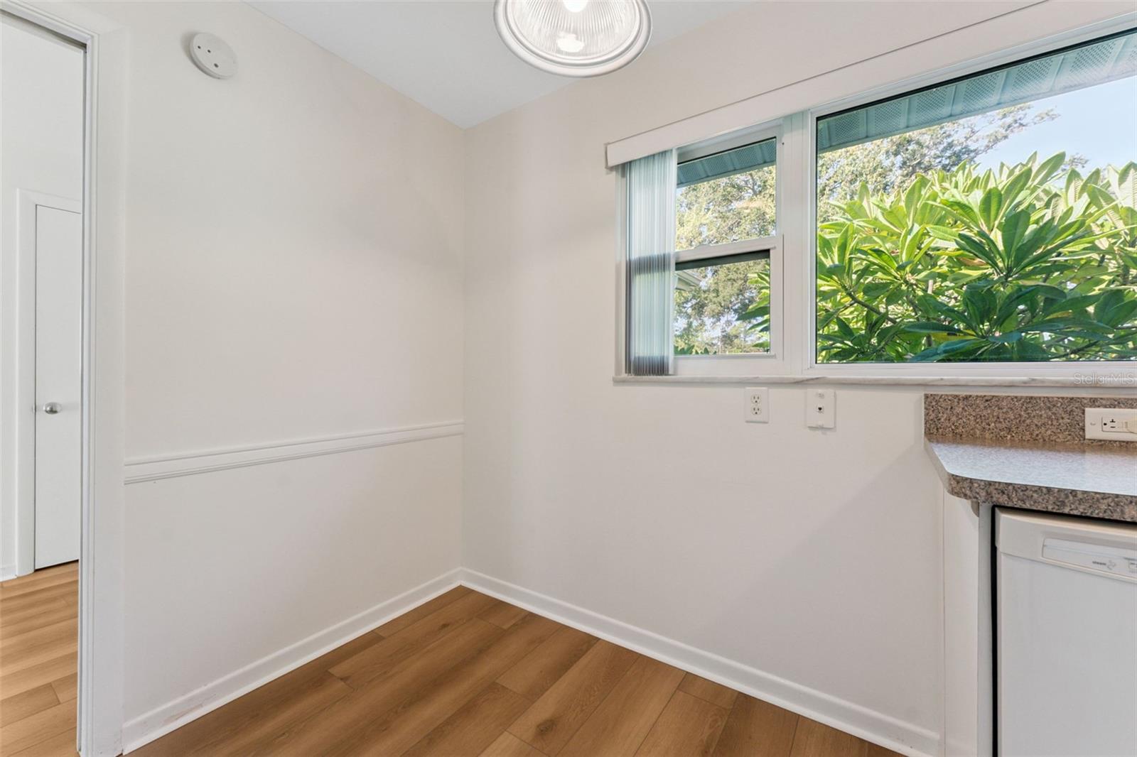 Cozy and convenient! The kitchen’s eat-in space is perfect for casual meals and morning coffee.