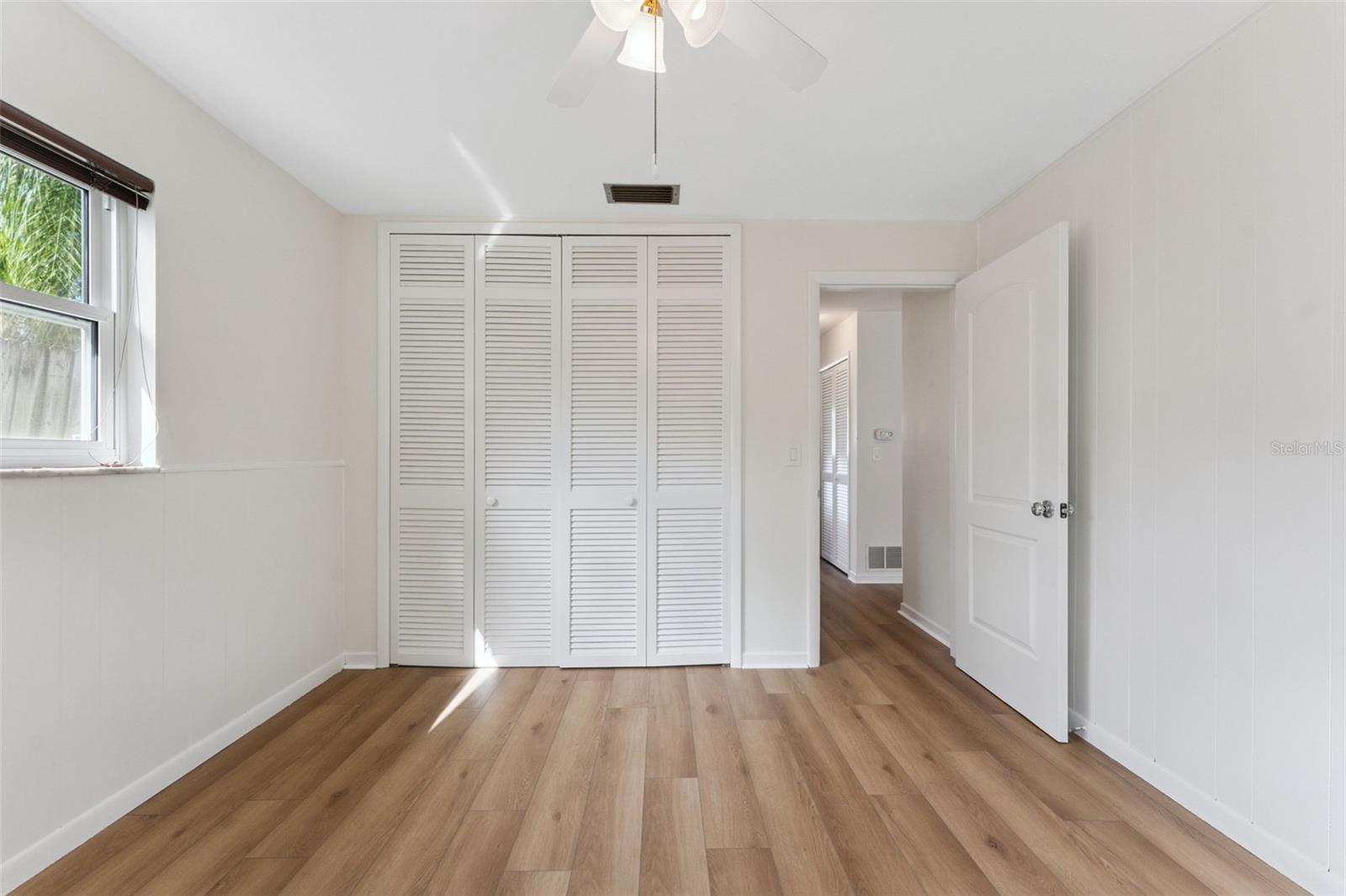 Bedroom 2 features a large built-in closet, keeping everything organized and easily accessible.