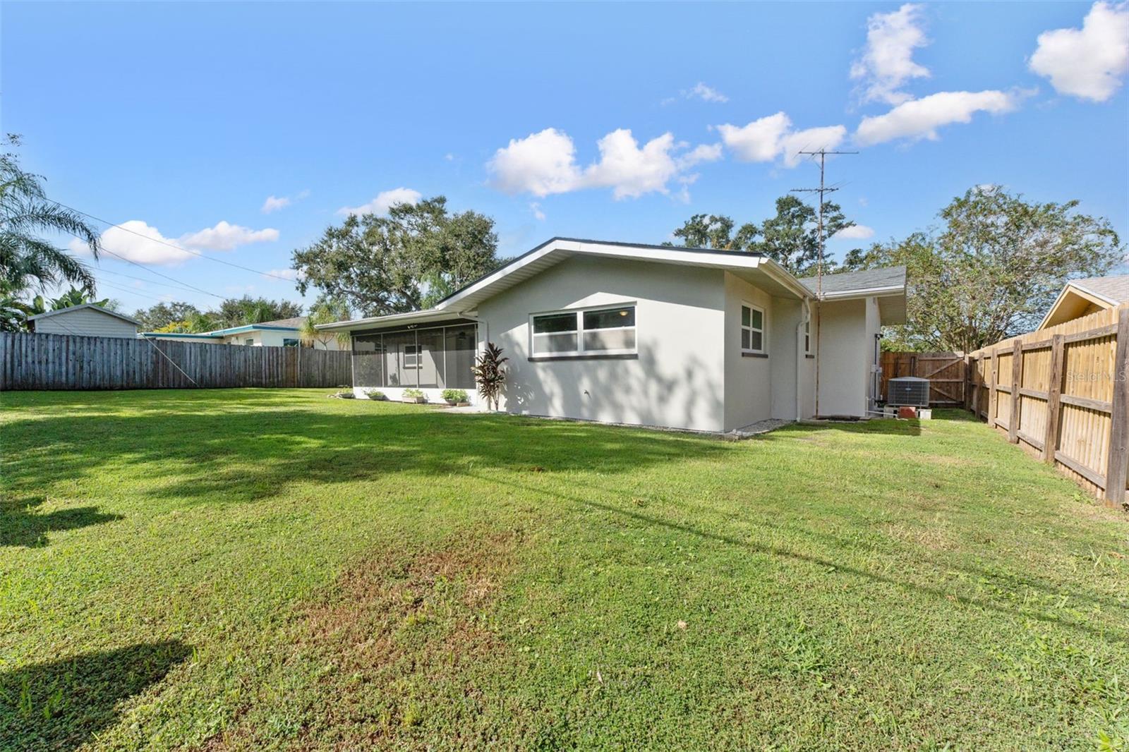 Safe, secure, and private—the fully fenced backyard is perfect for pets, kids, and peace of mind