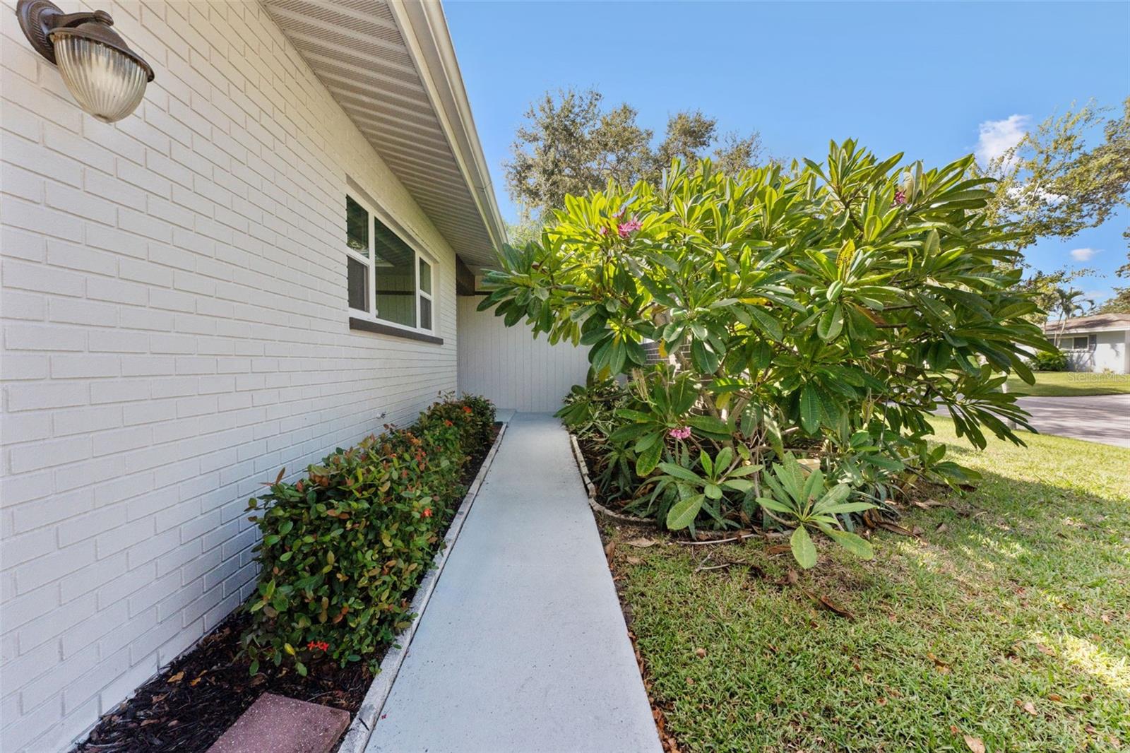 Charming walkway leading you right to the front door of your new Clearwater home