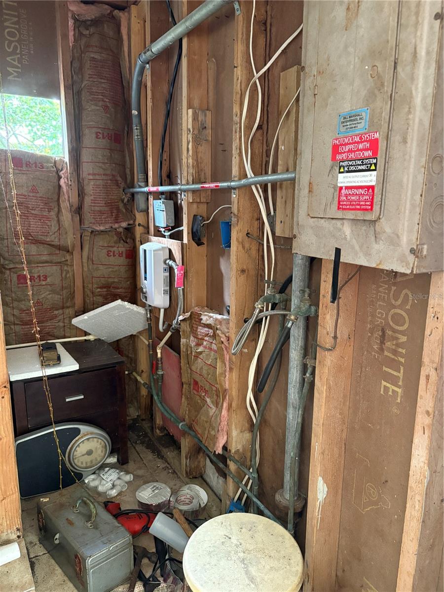 UTILITY ROOM OFF CARPORT