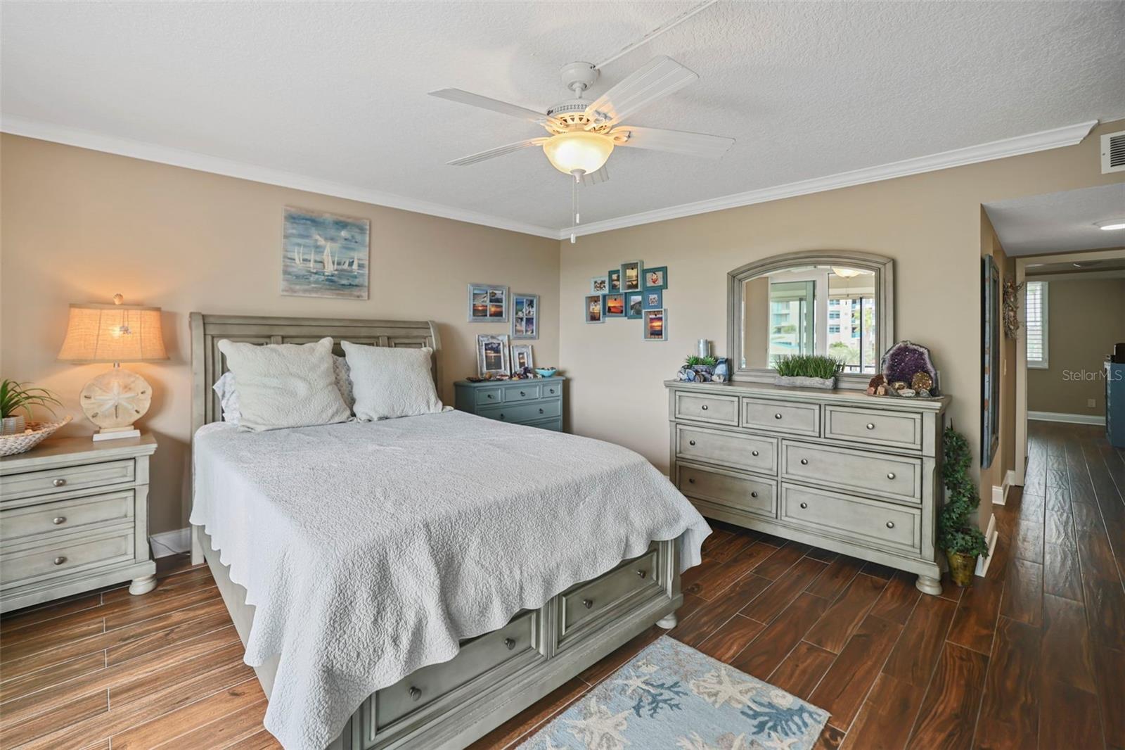 Primary Bedroom With Sliding Doors To The Balcony