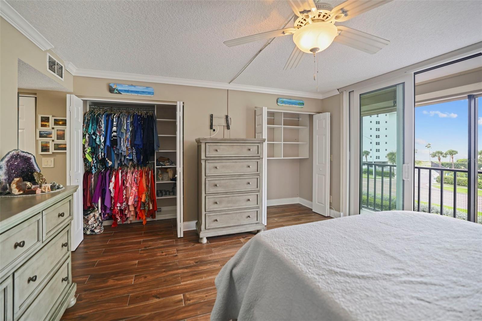 Primary Bedroom With "Closets By Design"