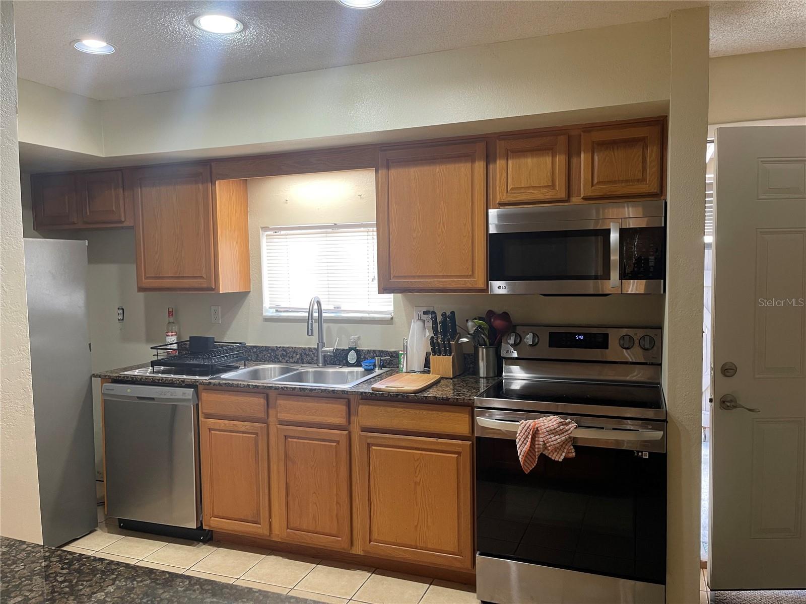 Kitchen with updated cabinets.