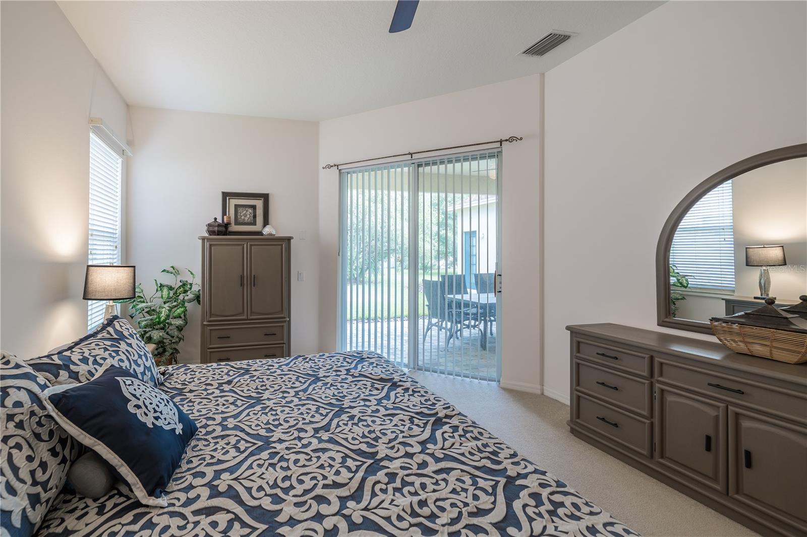 Primary Suite w/Neutral Carpet & Sliders to the Lanai