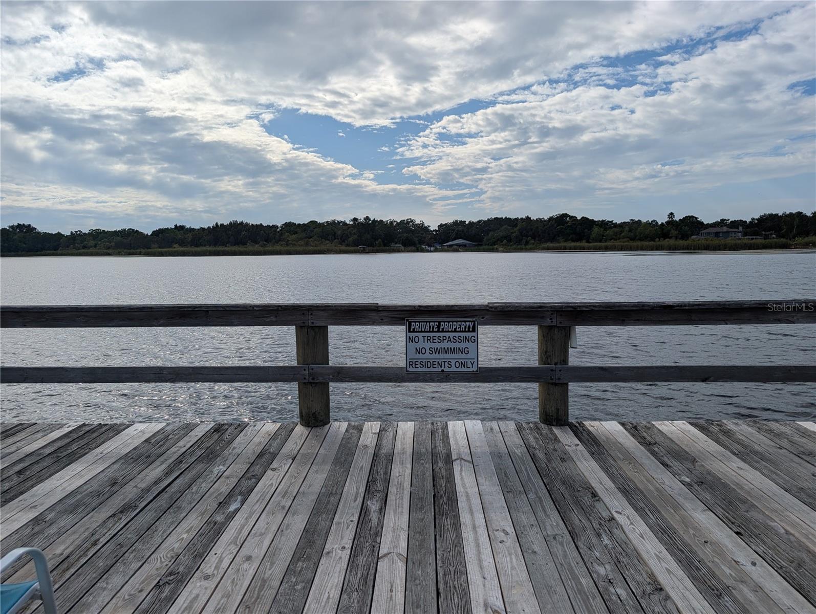 End of pier has a dock area to enjoy being over the water for turtle watching.