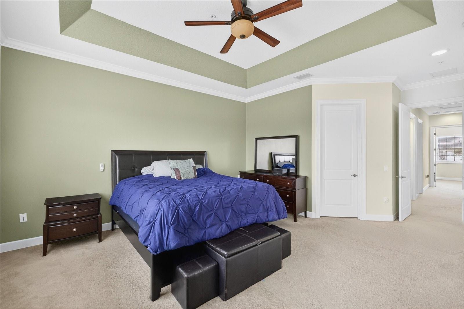 CUSTOM BUILT-INS IN LARGE WALK-IN CLOSET