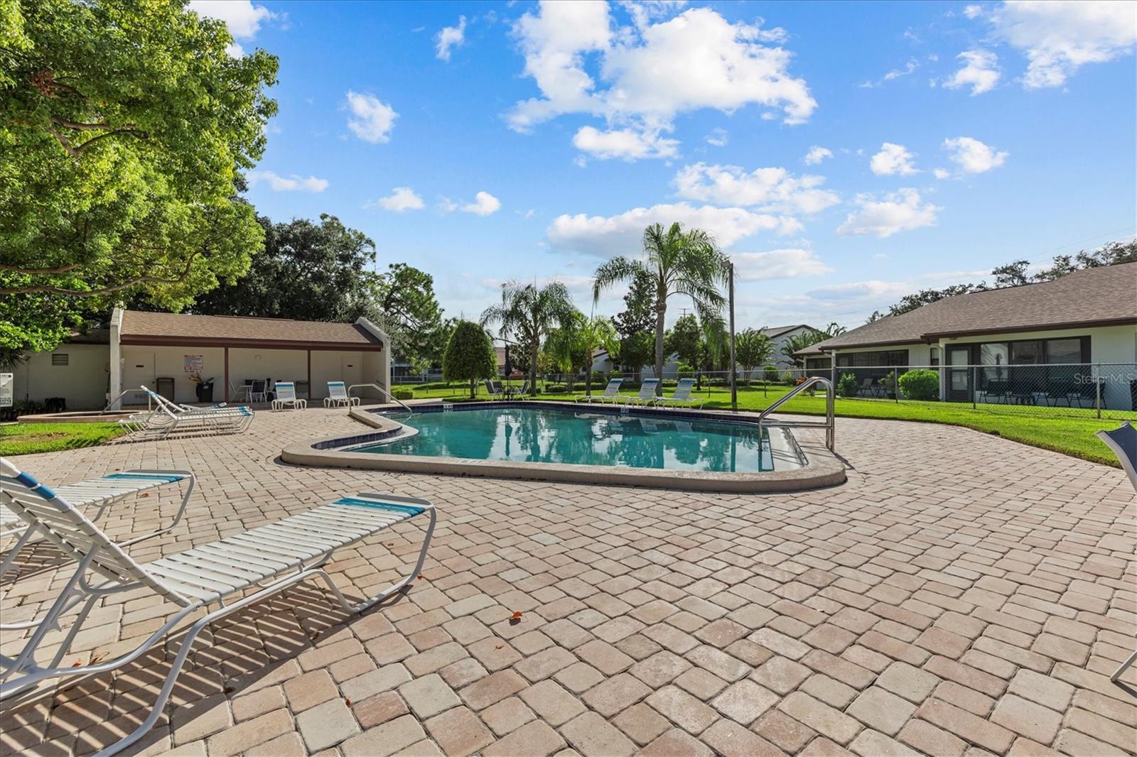 community pool with covered lanai