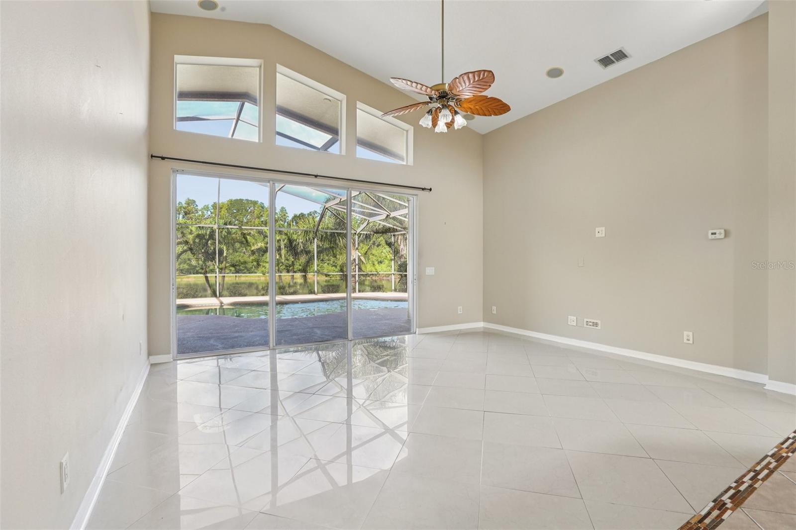 Family room overlooking pool
