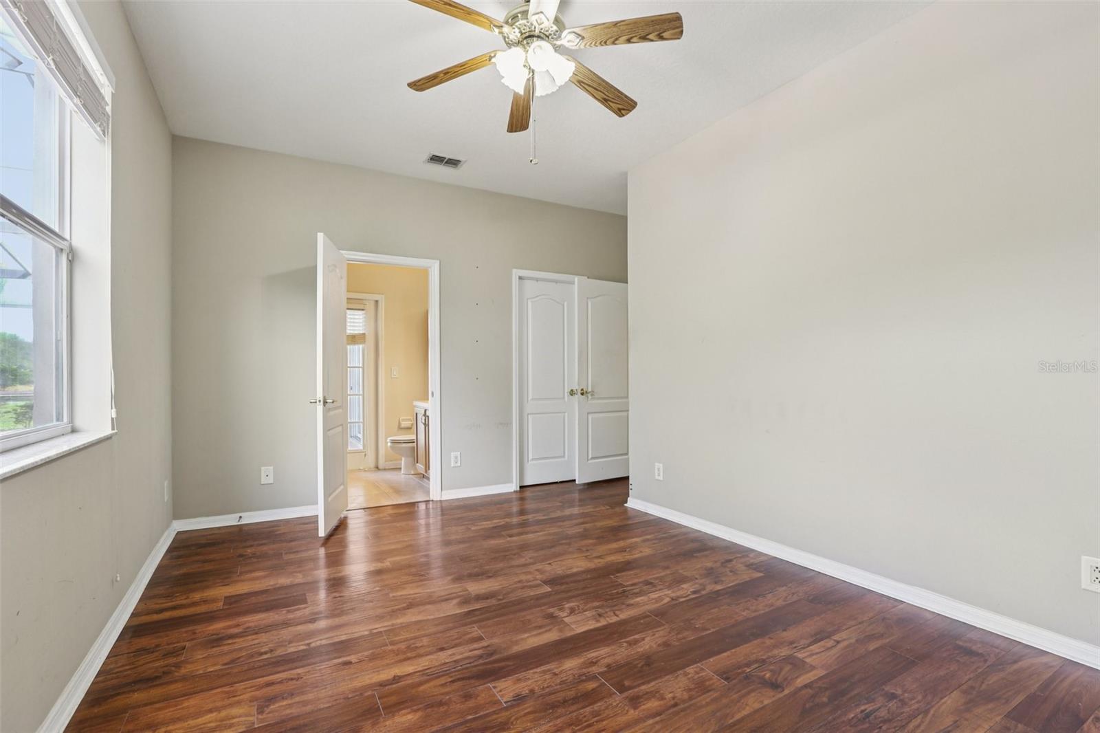2nd bedroom with private full bathroom (leads out to pool)