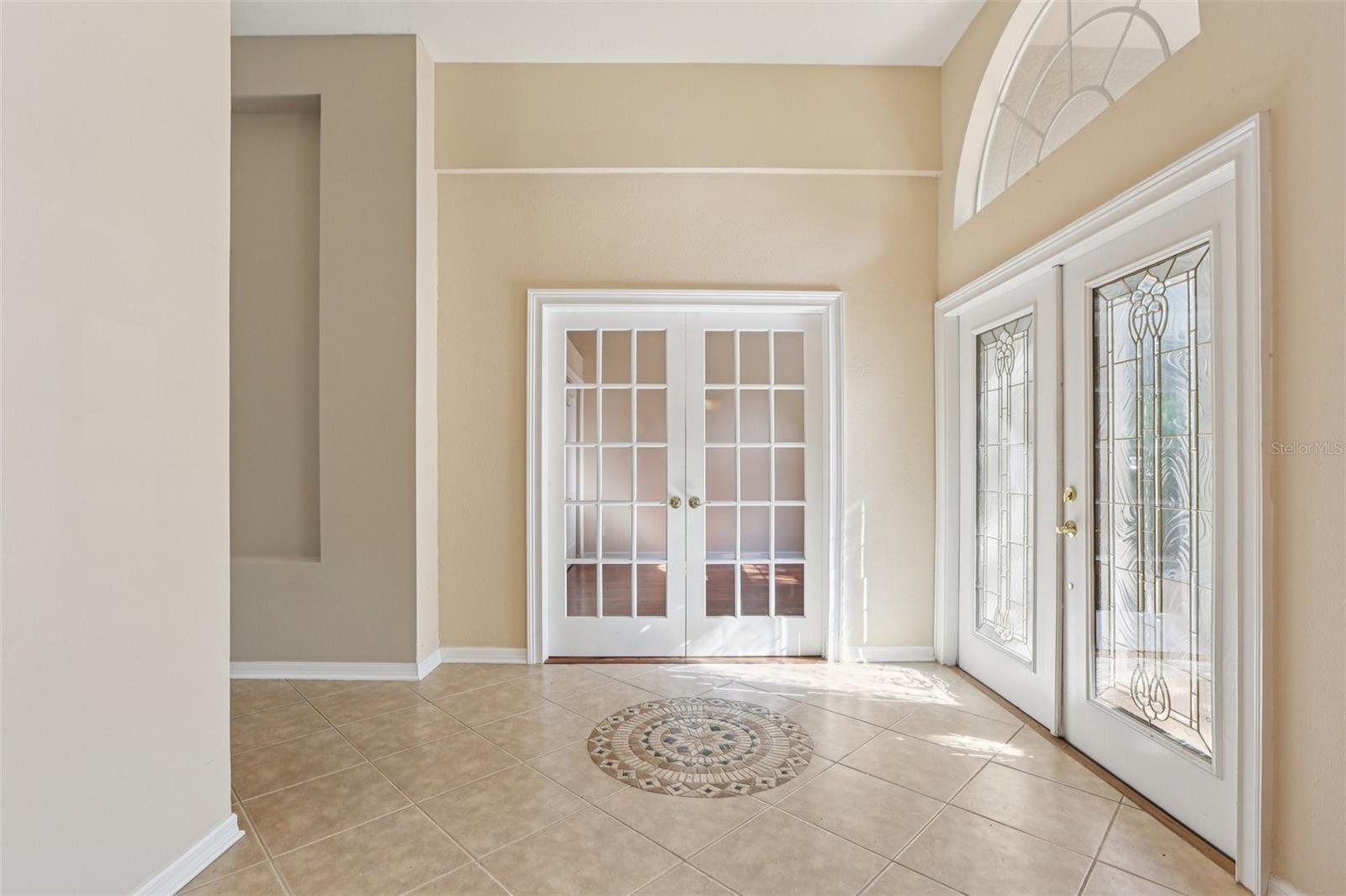 6th Bedroom, by front door (has closet)