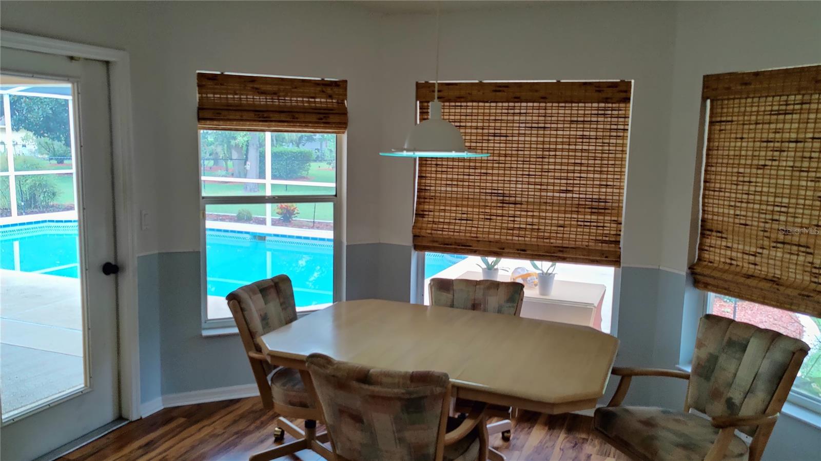 Kitchen breakfast nook to enjoy your morning coffee or you can step out and enjoy the pool view oasis in the lanai