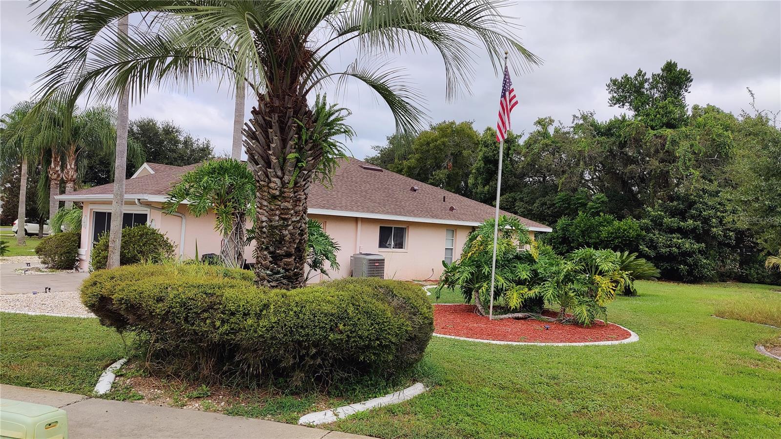 Right side of home. Large - nearly 1/2 acre  - lot has lots of elbow room!