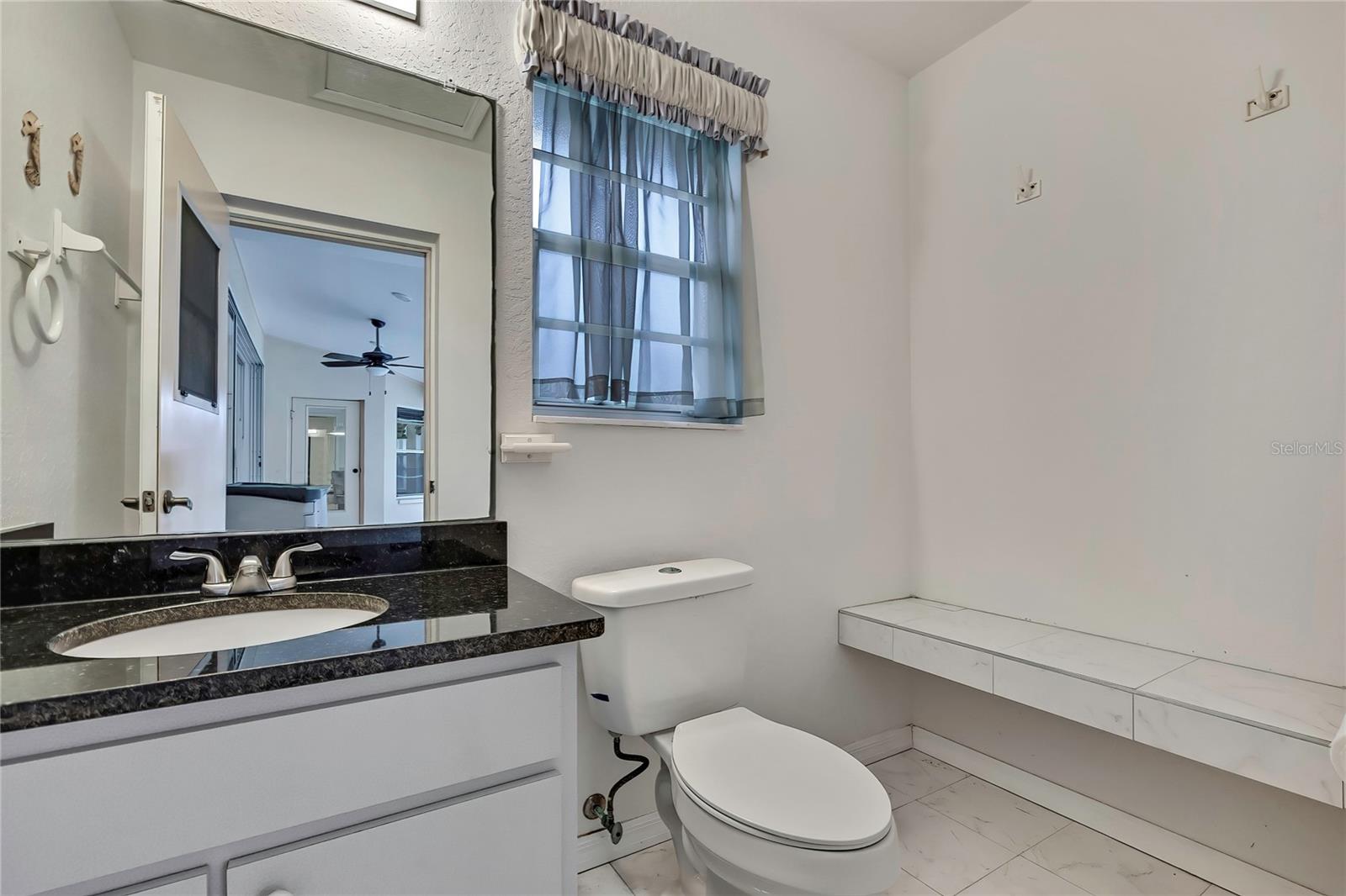 Pool area changing room in air conditioned half bath