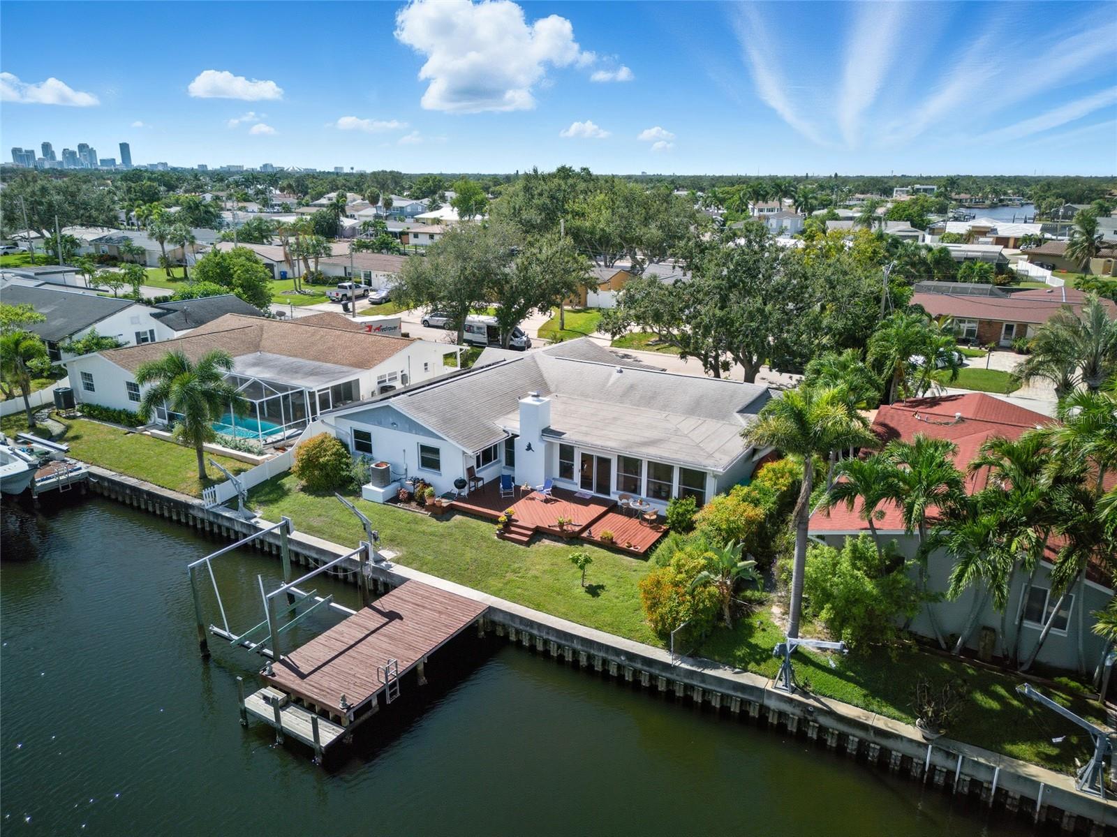 The home sits on a wide canal with 75ft of Seawall!