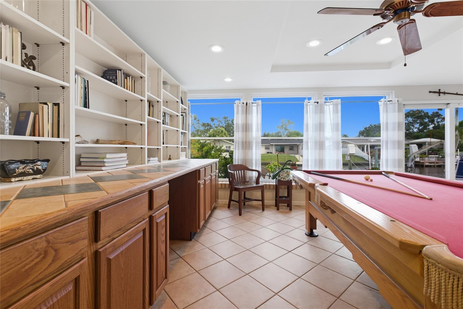 Are you an avid reader? There is PLENTY of room in these custom built in bookshelves