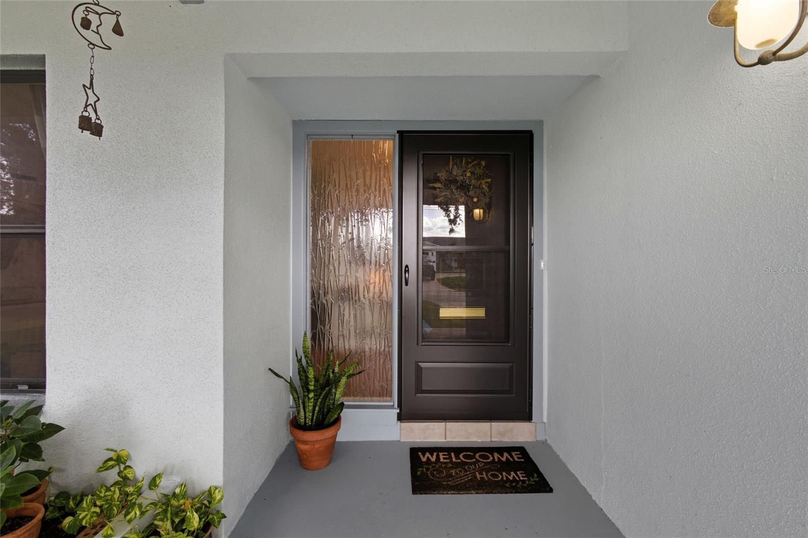 A covered front porch welcomes guests into your home!
