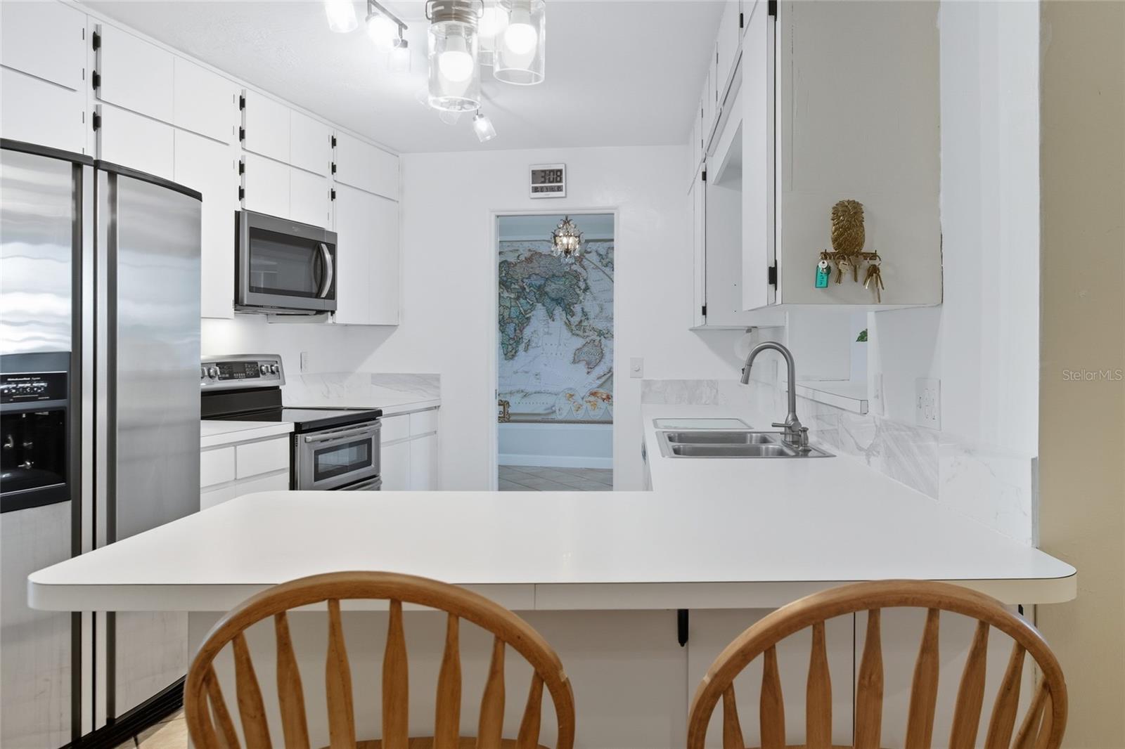 A small breakfast bar is perfect for quick bites and small talk when friends come to visit!