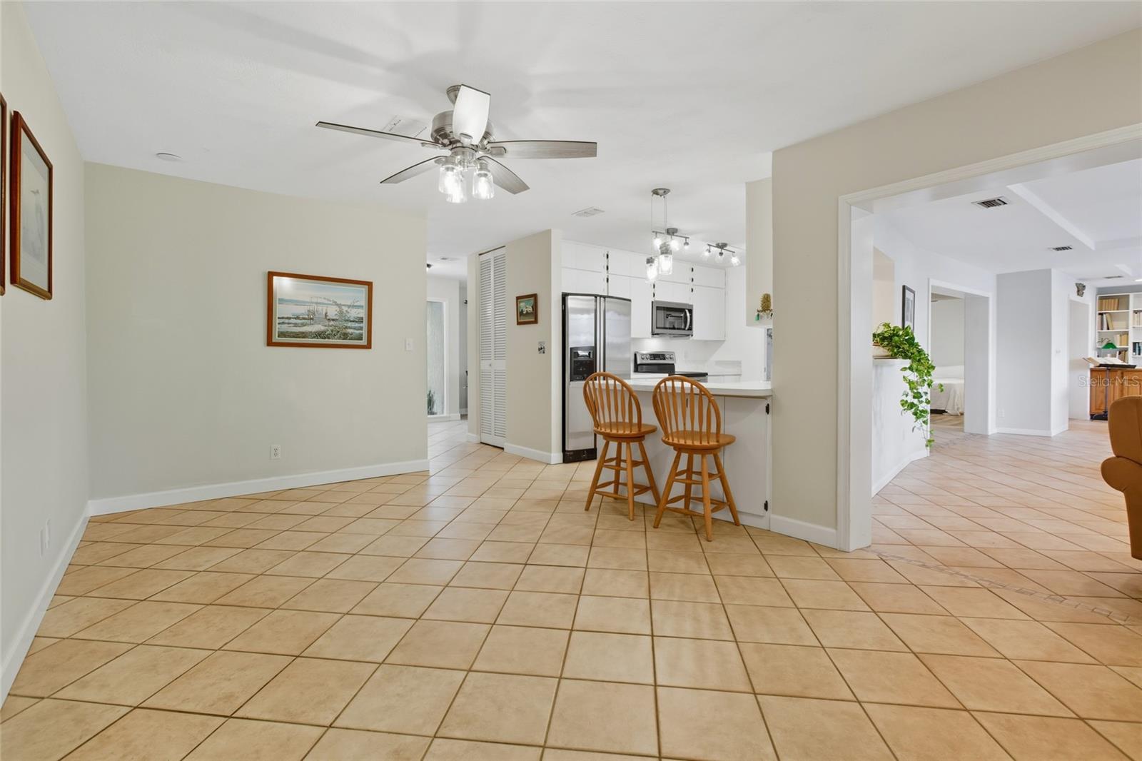 This dining room can easily accommodate a large table with extra inserts for those large gatherings!