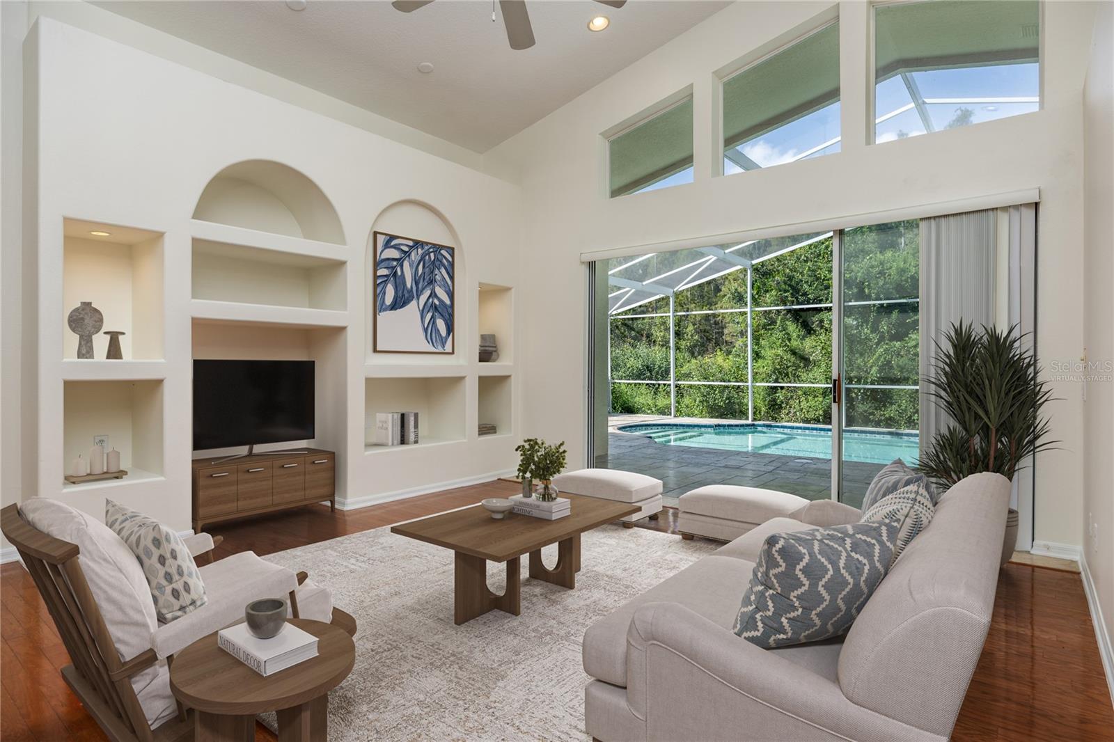 Nice Architecture windows and Pool view! Virtually Staged