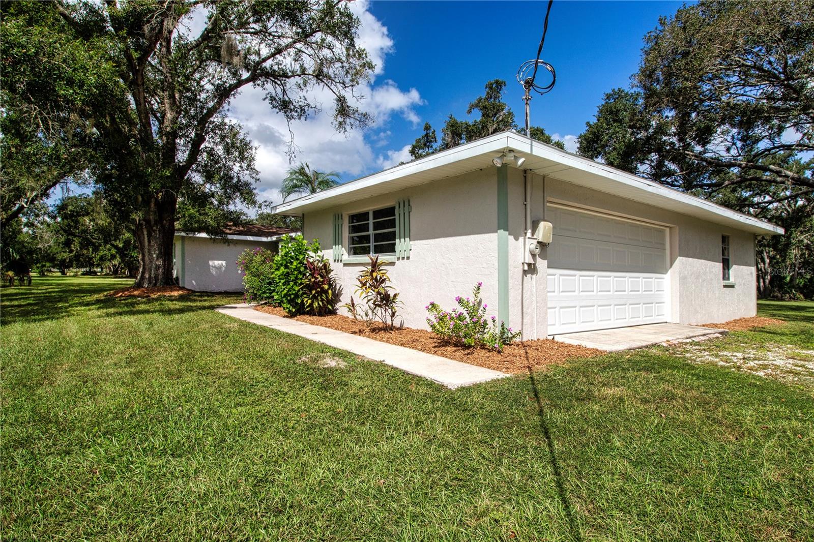 2 car garage freshly painted with new hurricane rates garage door