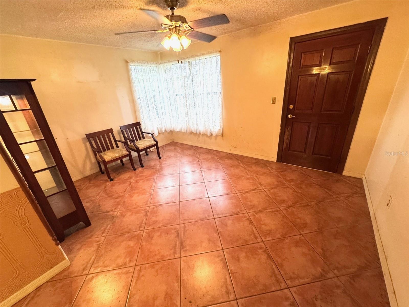 The living room and most of the other common area rooms has beautiful terracotta tile