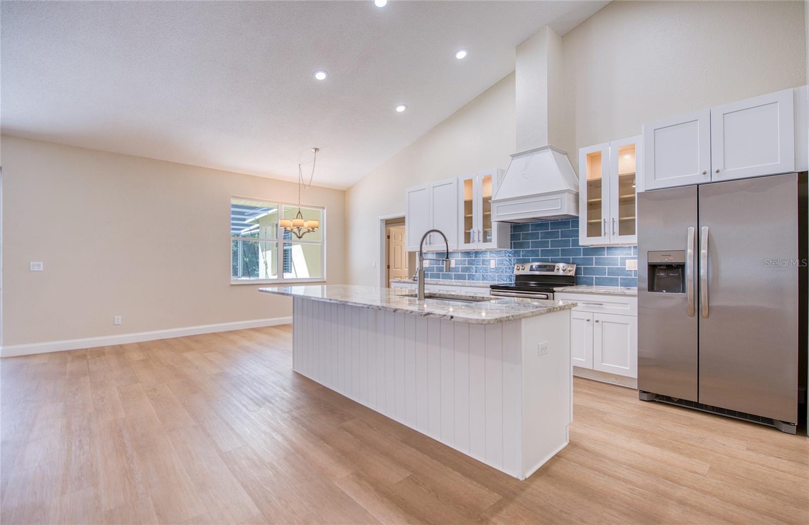 Second and third bedrooms off kitchen offer a split plan