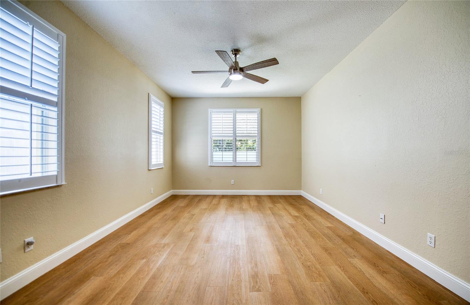 Spacious main bedroom in split plan layout